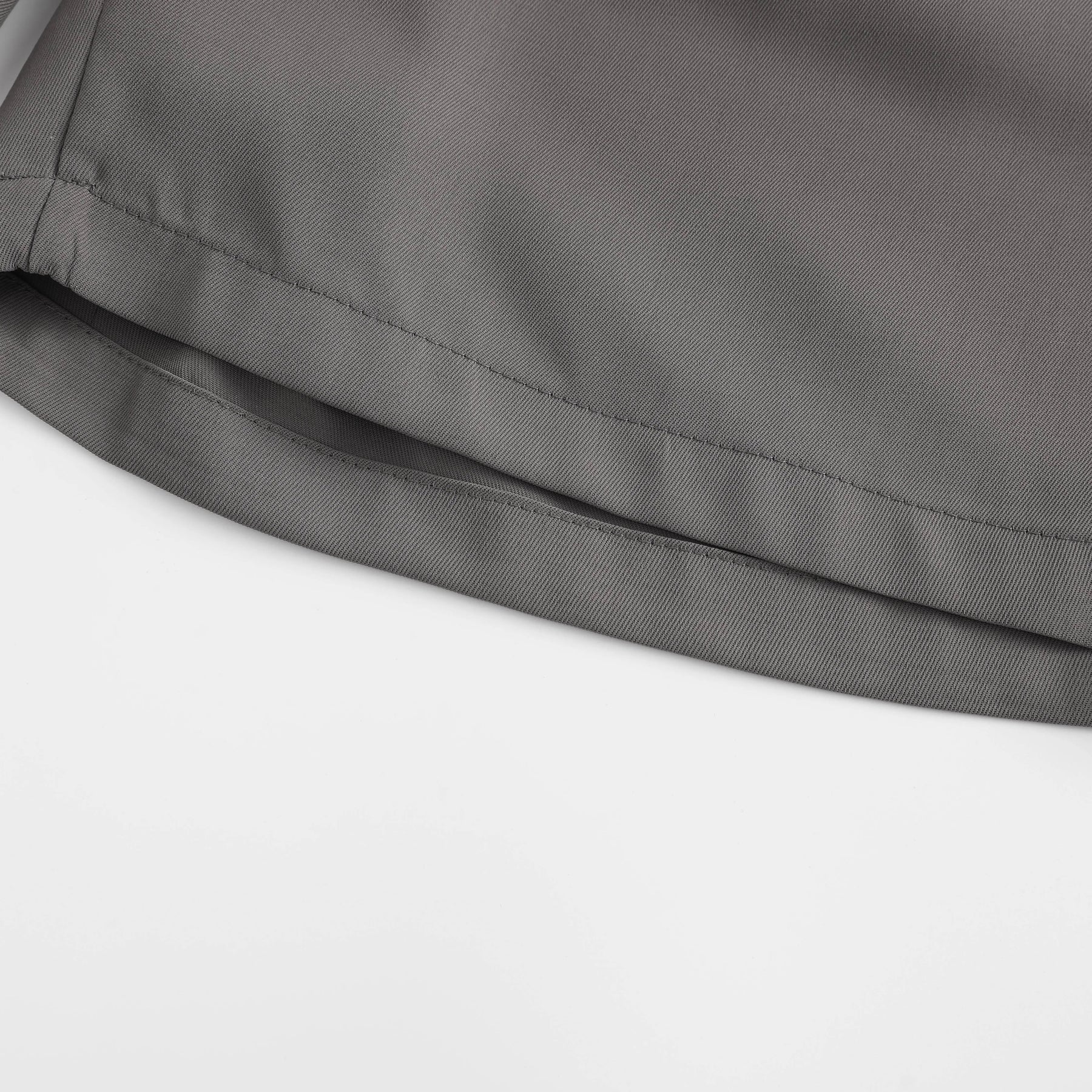 Clean tailored hem on men's suit shorts